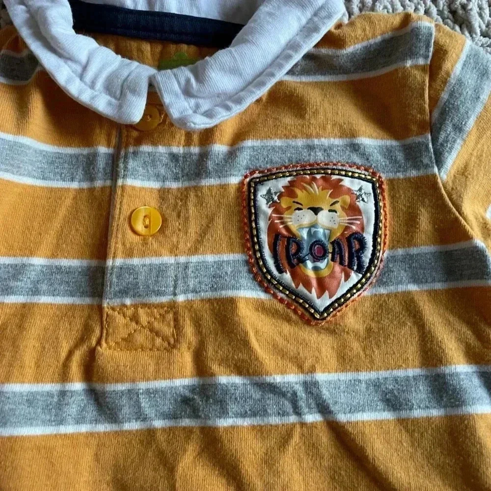 Sesame Street 6-9 months orange striped long sleeve lion shirt and jeans outfit​